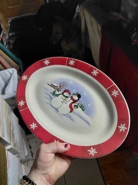 Royal Seasons snowman oval platter features a festive red border  white. 14"